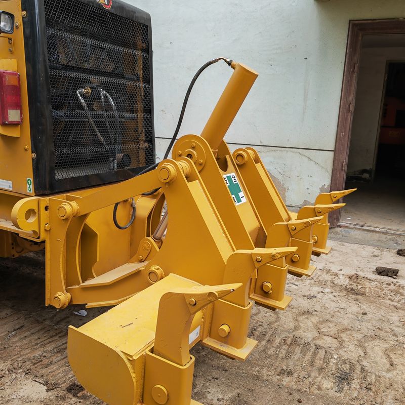 Kullanılmış kazıcı arazi düzeltme makinesi Caterpillar CAT140K yol makinesi ikinci el Japon traktör motoru iyi durumda